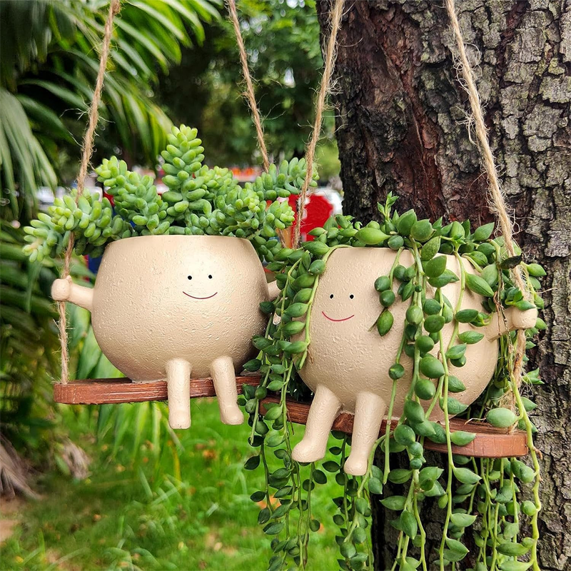 Sappige bloempot Schattig lachend gezicht Swing bloempot