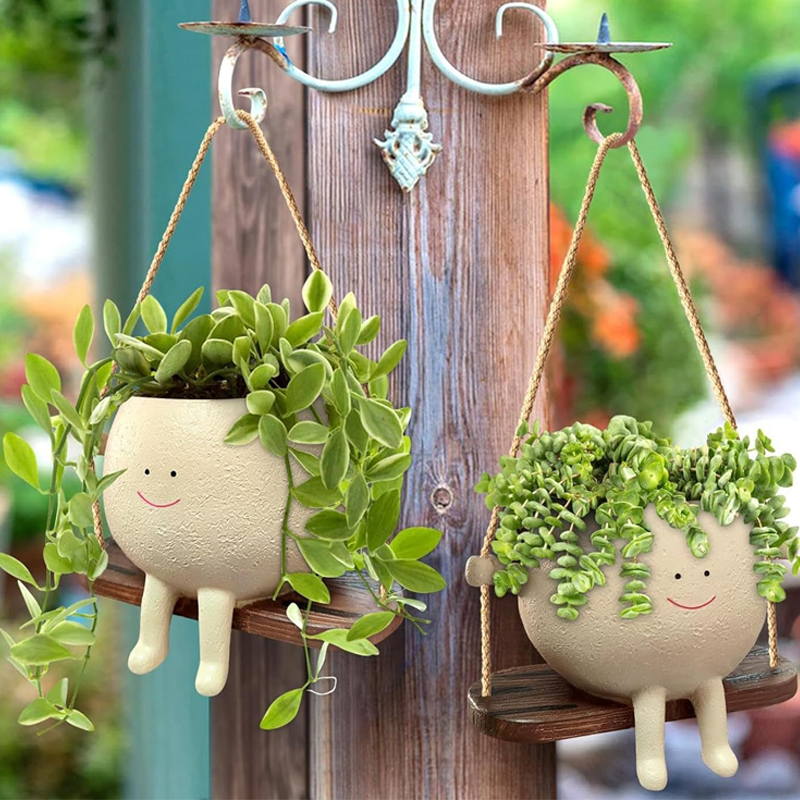 Sappige bloempot Schattig lachend gezicht Swing bloempot